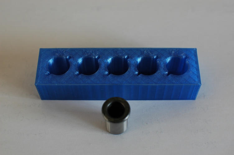 3D printed test piece with drill bushing.