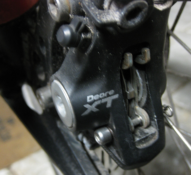 close-up of a Deore XT hydraulic brake caliper