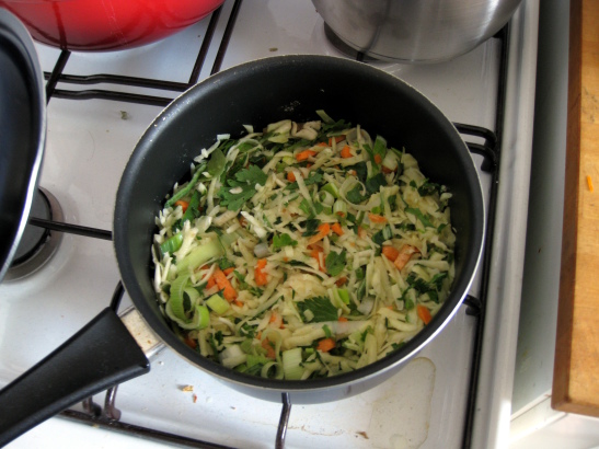 rösti cooking in the pan