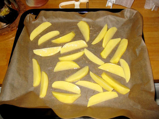 wedges spread out on baking tray